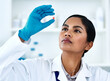 Leinwandbild Motiv Woman, pills and medical science research or scientist development for future drugs, medicine or product. Face of female worker in laboratory for pharmaceutical discovery, innovation and analysis