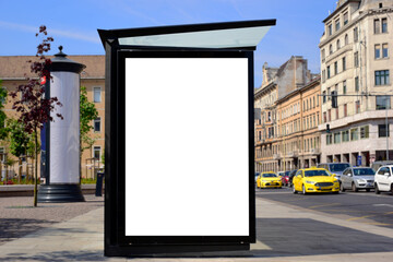 Wall Mural - bus shelter at bus stop. white poster ad display space and lightbox. mockup template. blank ad panel. glass design. urban street setting. car traffic along the road. yellow cab.