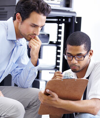 Wall Mural - Teamwork, IT and men with clipboard in server room for maintenance, inspection and fixing. Checklist, network technician and tech support for cybersecurity, information and help in data center.