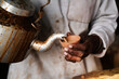 A man pouring traditional indian clay pot tea. Also known as traditional Kulhad tea. 