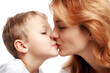 © Loks - Caucasian mother and child kissing and hugging on a white background