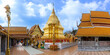 Amazing panorama view of Wat Phra That Doi Suthep with golden stupa and blue sky, the most famous temple in Chiang Mai, Thailand
