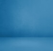 © daboost - Empty blue concrete interior background