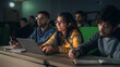 © Gorodenkoff - Close Up Portrait of a Smart Beautiful Indian Female Student Studying in University with Diverse Multiethnic Classmates. Young Woman Using Laptop Computer and Taking Notes During the Lecture