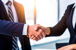 © graja - Close-up of shaking hands after a business meeting. AI generated