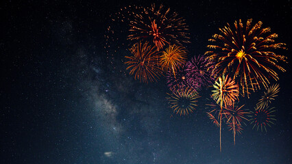 Wall Mural - fireworks with blur milky way background