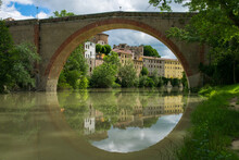 View Of Ponte Della Concordia, Ancient Roman Bridge Over The River Metauro In The Center Of Fossombrone Town, Marche Region, Italy
