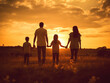 © Yusuf - silhouette of family walking at sunset