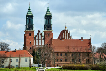 Poster - Historic buildings and towers of the gothic cathedral in the city of Poznan