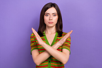 Wall Mural - portrait of serious confident lady wear stylish clothes showing stop symbol no war isolated on purpl