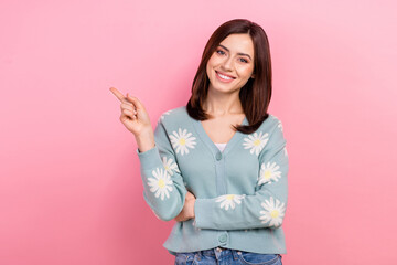 Wall Mural - photo of sweet pretty woman dressed teal outfit pointing empty space isolated pink color background
