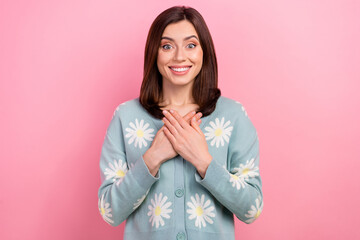 Sticker - Photo of overjoyed cute young lady hold arms on chest feel appreciation best gift wear cardigan isolated pink color background