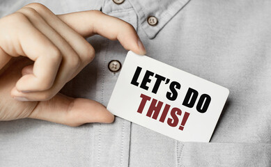 Poster - man putting a card with text lets do this in the pocket