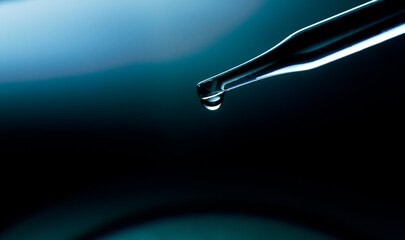 Wall Mural - blue macro science experiment pipette surface,macro shot of gel with different sized tiny bubbles co