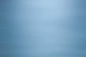 blue gradient abstract background with soft sparkle texture.