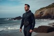 Lifestyle portrait photography of a satisfied man in his 30s wearing a comfortable tracksuit against a water or ocean background. Generative AI