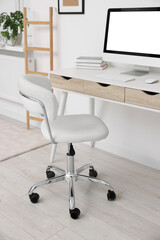 Canvas Print - Workplace with comfortable office chair indoors. Interior design