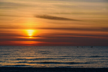 Wall Mural - Spectacular bright golden sunset over Baltic sea