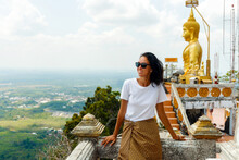 Beautiful Girl On The Top Of The Mountain Visits The Tiger Temple, Krabi, Thailand. Man Enjoying The Panorama Of The Mountains.