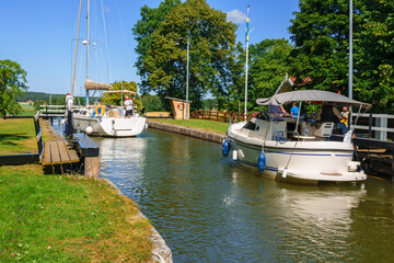 Canvas Print - Boats heading into a lock on a sunny summer day