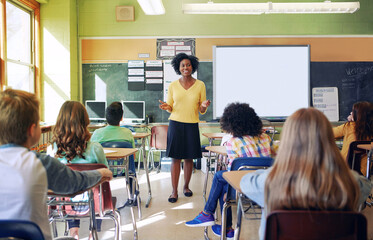 education, school and a teacher black woman in a classroom with student children for learning. schol