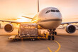 © VisualProduction - Loading cargo plane outside air freight logistic. Airmail shipping packages. Shipping boxes ready to be delivered. Generative AI