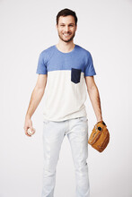 Man, Portrait And Holding Baseball With Glove In Studio For Safety, Pitch Or Catch In Sport Game By White Background. Guy, Isolated Model And Softball In Sports Gear, Fitness And Training With Smile