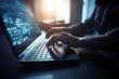 © liquid2000 - person typing keyboard on a laptop