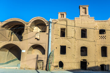 Poster - Entry gate to abandoned part of Kharanaq historic town in Yazd Province, Iran