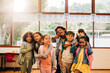 © Jacob Lund - Back to school excitement. Group of primary school kids making funny faces and looking at the camera