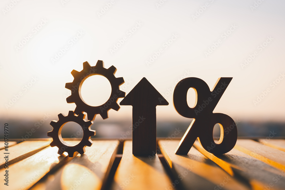 Interest Rates Risk Silhouette Foto de Stock Silhouette of percentage model and up arrow with evening ...