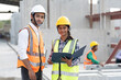 India engineer woman and Asia engineer man working with document at precast site work 