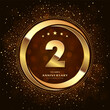 © As - 2nd anniversary logo with double rings and gold font decorated with glitter and confetti