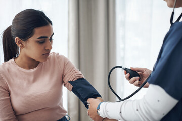 Poster - Blood pressure, woman and health test with support at a clinic and healthcare hospital with doctor. Monitor, checking and nurse with young female patient at a wellness and medical consultation