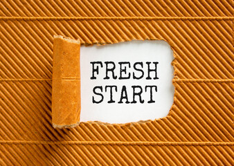 Wall Mural - Fresh start and motivational symbol. Concept words Fresh start on beautiful white paper. Beautiful brown paper cardboard background. Business motivational Fresh start concept. Copy space.