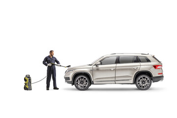 Canvas Print - Full length shot of a worker washing a SUV with a pressure washer brush