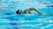 © Designpics - young healthy with muscular body man swim on swimming pool and representing healthy and recreation concept