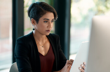 Poster - Tablet, computer and business woman in office for website analysis, online management or technology solution. Review, typing or scroll of professional biracial person on desktop and digital software