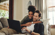 © A. Frank/peopleimages.com - Laptop, streaming and an interracial couple watching a movie using an online subscription service for entertainment. Computer, relax or internet with a man and woman bonding together over a video