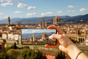 Travel photography: Taking photos via cellphone. Florence, Italy.