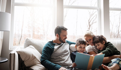 Wall Mural - Family, reading book with parents and children, happiness at home with story time and learning. Love, relationship and happy people bonding and care in living room with education and development