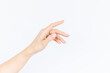 © Kalyakan - Beautiful asian woman hand isolated on white background, Empty open woman hand on white background, Female hand on white background.