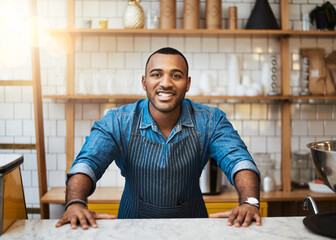 Canvas Print - Coffee shop, counter and portrait of black man in restaurant for service, working and welcome in cafe. Small business owner, barista startup and happy male waiter smile in cafeteria ready to serve