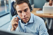 © Viglietti/peopleimages.com - Businessman, call center and consulting with headphones in customer support, service or telemarketing at office. Man employee consultant or agent talking on PC for online advice or help in contact us