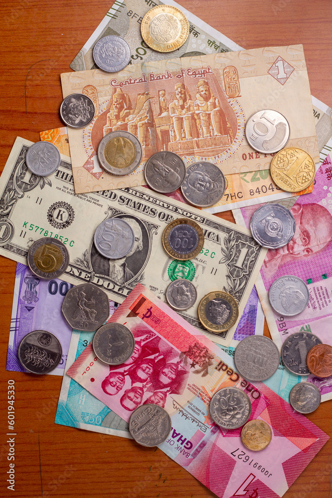 Major currencies in the world. notes and coins background. Stock Photo ...