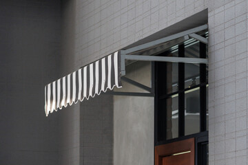 Sticker - the black and white striped awning of the house canopy. exterior canvas roof. blind sun