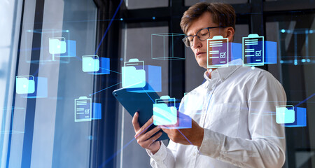Poster - Businessman working with tablet, document management system hologram