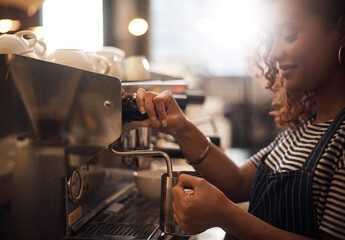 Wall Mural - Coffee machine, woman and barista steam milk in cafeteria for latte, espresso and drink appliance for catering. Waitress heating jug for hot beverage, caffeine process and restaurant service industry