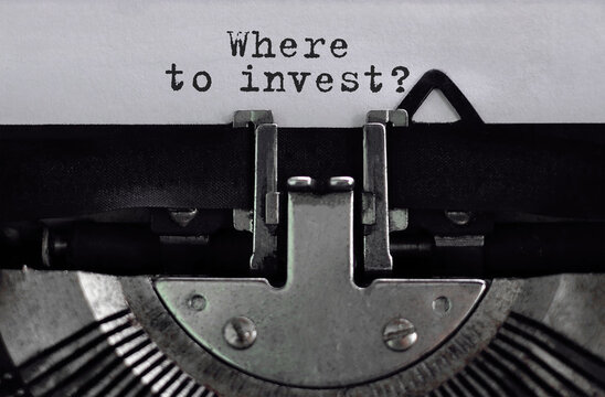 Text Where to invest typed on retro typewriter