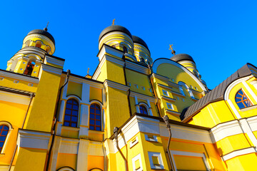 Yellow church with domes . Orthodox place of worship 